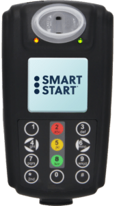a black rectangular device with a screen and buttons